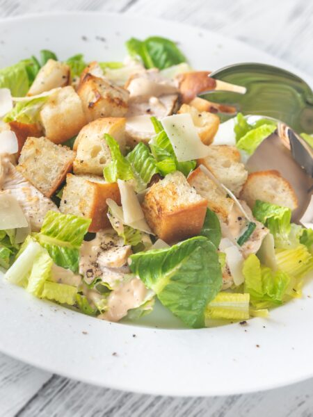 Caesar Salad served in a white bowl