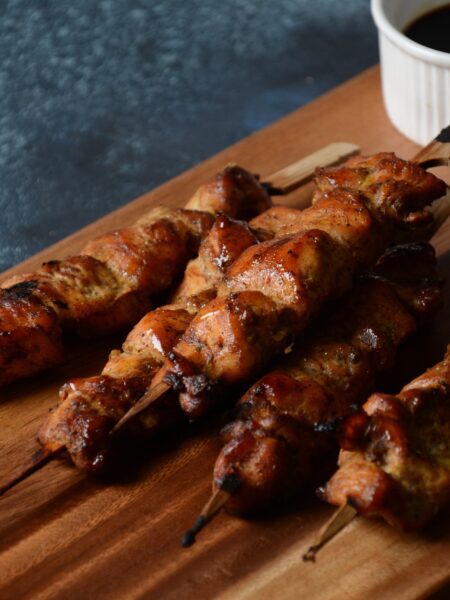 Yakitori Chicken skewers served on a wooden board