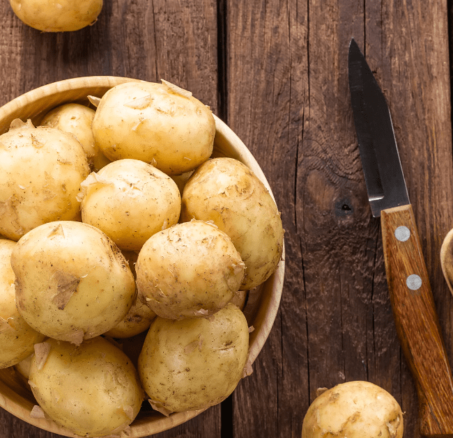 New potatoes in a bowl on a table